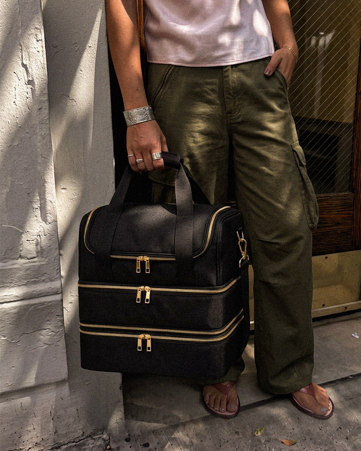 Black structured bag with gold hardware